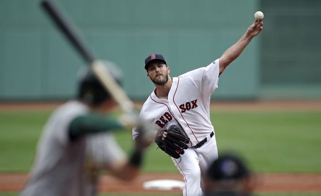 Red Sox pitcher Drew Pomeranz allowed two hits, including a home run, and struck out one batter in 4 1/3 innings of work during a rehab start at McCoy Stadium in Pawtucket on Sunday. [CHARLES KRUPA/THE ASSOCIATED PRESS]