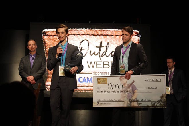Grand Valley State University students Jordan Vanderham and Jared Seifert won $30,000 at the Outdoor Weber Competition, hosted by Weber State University in Ogden, Utah. The two students won for their product Orindi Mask, which is designed to enable workers in cold environments to breathe comfortable warm air. [Contributed]