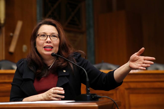 In this Feb. 14 photo, Sen. Tammy Duckworth, D-Ill., speaks on Capitol Hill, in Washington. Duckworth has given birth to a baby girl, making her the first U.S. senator to give birth while in office. [AP Photo/Alex Brandon, File]