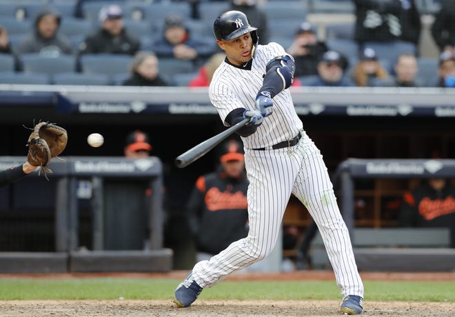 Yankees' Giancarlo Stanton strikes out against the Orioles on Sunday. Stanton is batting .167 with 20 strikeouts in 42 at-bats in his first year with the Bombers. [THE ASSOCIATED PRESS]