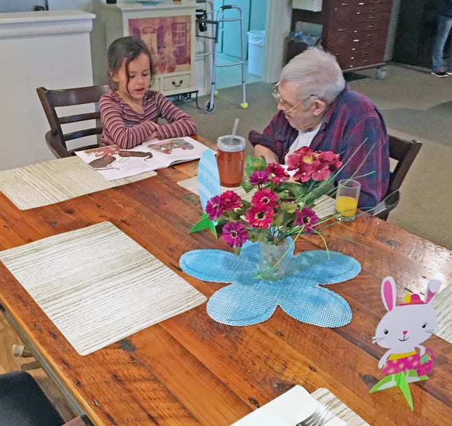 First graders at Jennings Elementary School read to residents of Quincy Cottage for March is Reading Month. Courtesy Photo