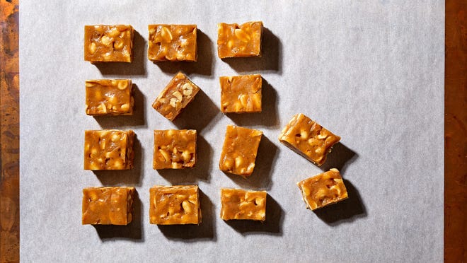 The double dose of peanuts in Mini Peanut Bars — in the form of whole nuts and "natural" peanut butter — makes these bars filling and satisfying. [The Washington Post / Stacy Zarin Goldberg]