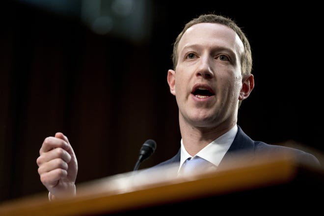 Facebook CEO Mark Zuckerberg told lawmakers on Capitol Hill Tuesday: "It's clear now that we didn't do enough to prevent these tools from being used for harm as well." [AP / Andrew Harnik]