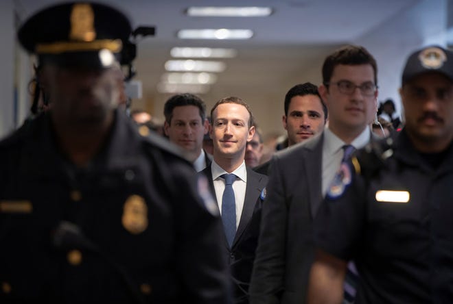 Facebook CEO Mark Zuckerberg arrives on Capitol Hill in Washington, Monday, April 9, 2018, to meet with Sen. Dianne Feinstein, D-Calif., the ranking member of the Senate Judiciary Committee. Zuckerberg will testify Tuesday before a joint hearing of the Commerce and Judiciary Committees about the use of Facebook data to target American voters in the 2016 election.