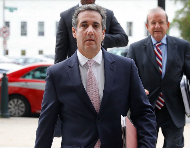 In this Sept. 19, 2017, file photo, Michael Cohen, President Donald Trump's personal attorney, arrives on Capitol Hill in Washington. Cohen, is challenging porn actress Stormy Daniel's unsubstantiated charge that someone tied to Trump threatened her with physical harm if she went public with her story about a tryst with Trump years ago.