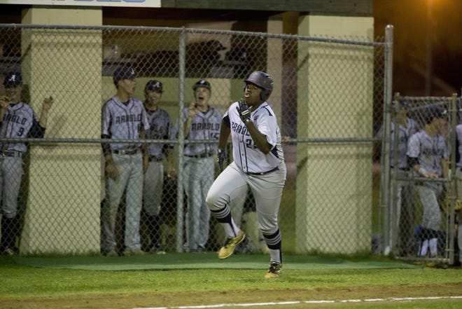 Arnold's Darius Reynolds scores a run against North Bay Haven during Tuesday's game at Cain Griffin Park. [JOSHUA BOUCHER/THE NEWS HERALD]