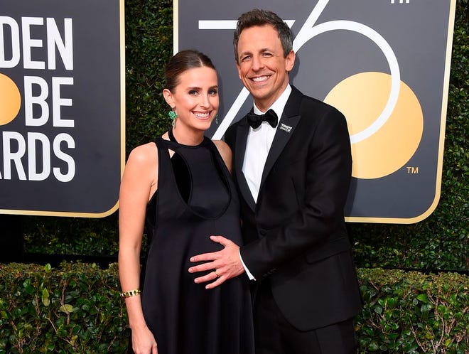 Alexi Ashe, left, and Seth Meyers arrive at the 75th annual Golden Globe Awards in Beverly Hills, Calif., on Jan. 7, 2018. (Photo by Jordan Strauss/Invision/AP, File)
