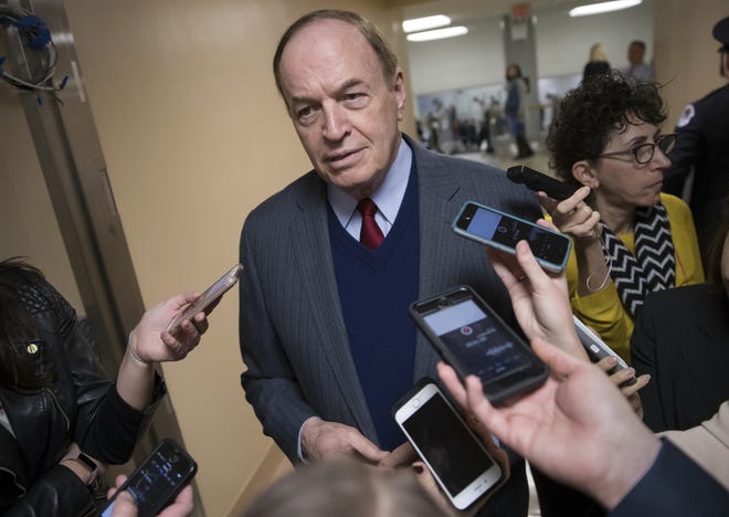 Reporters seek a comment from Sen. Richard Shelby, R-Ala., on Capitol Hill in Washington, Tuesday, Dec. 12, 2017. [The Associated Press]