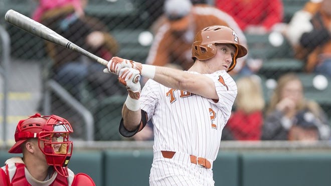 Texas infielder Kody Clemens (2) eyes the ball he hit during a NCAA college baseball game against Louisiana-Lafayette in Austin, Texas, on Sunday, Feb. 18, 2018. NICK WAGNER / AMERICAN-STATESMAN