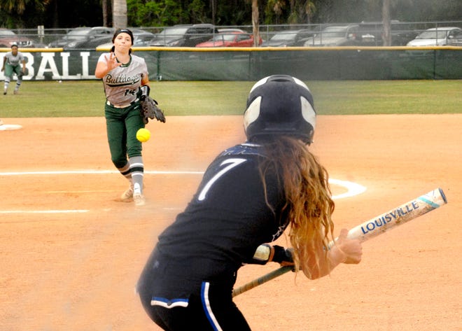 Flagler Palm Coast's Leah Scott pitches to Matanzas batter Emma Ford during last Wednesday's game at Pirate Field. A 10-run rally in the second inning led the Lady Pirates to a 16-2 rout of their cross-town rivals at Bulldog Field. [News-Tribune photos/Rafael Crisostomo]