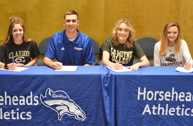 Four athletes signed to play at the collegiate level on Wednesday in Horseheads. Pictured from left are Kaylin Quanz, Nate VanBrunt, Emily Cunningham and Lacey O'Donnell. [ERIC WENSEL/THE LEADER]