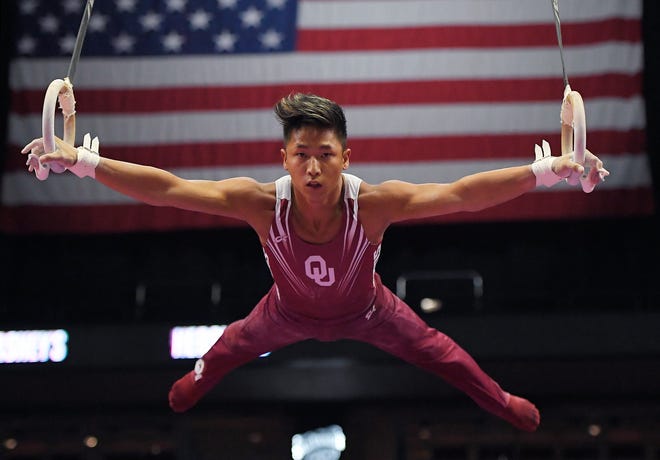 CORRECTS SPELLING TO YUL, INSTEAD OF YUP - Yul Moldauer competes on the rings during the men's final round of the U.S. gymnastics championships, Saturday, Aug. 19, 2017, in Anaheim, Calif. Moldauer won the all-around title. (AP Photo/Mark J. Terrill)