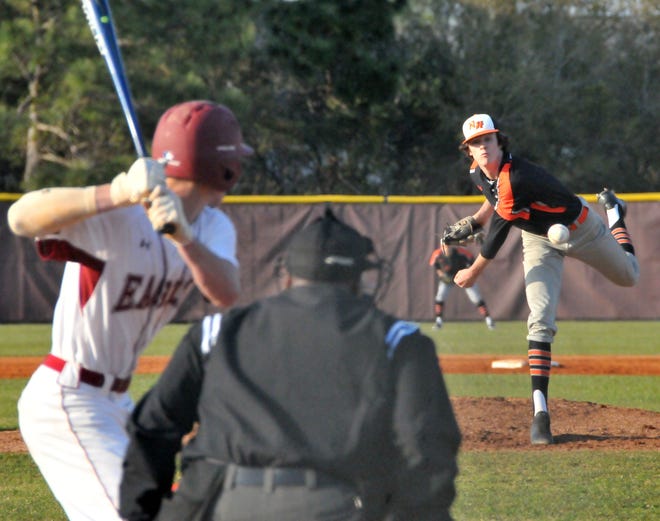 New Hanover junior pitcher Blake Walston retired the final 10 batters he faced Tuesday to lead the Wildcats to a 3-2 victory over Ashley. [Tim Hower/StarNews]