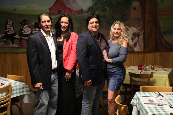 The Homestead Restaurant is open again in Jacksonville Beach under co-owners Pamela and Hal Batoon (from left), and Derek Johns, and general manager Kristen Marr. [Courtesy Pamela Batoon]