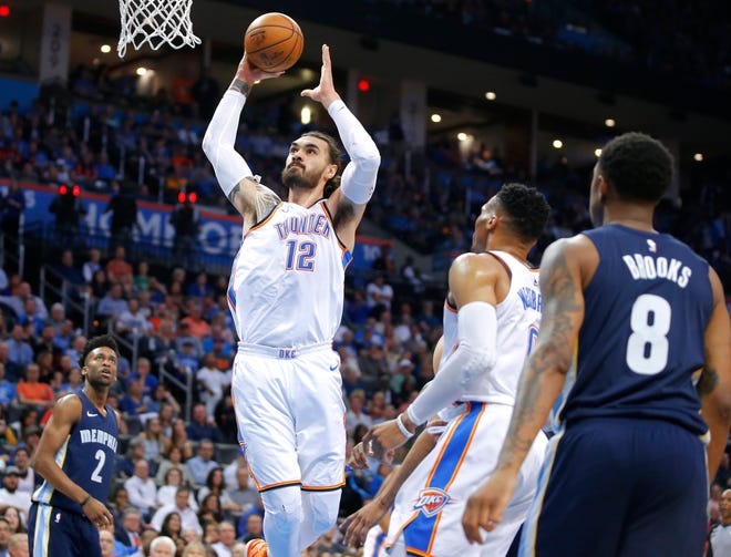 Steven Adams, left, averaged a career-high 13.9 points per game in 2017-18. The Thunder center has increased his scoring average every season in the NBA. [PHOTO BY BRYAN TERRY, THE OKLAHOMAN]