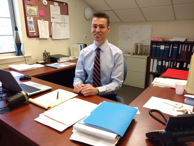 Bryan Kaenrath settles in as North Hampton's town administrator. [Photo by Jesse Migneault]