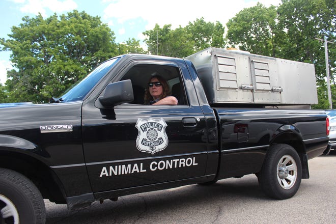 Portsmouth police are lauding animal control officer Bonnie Robinson, for "an unprecedented" 100 percent pet-licensing compliance during the past three years. [Courtesy photo]