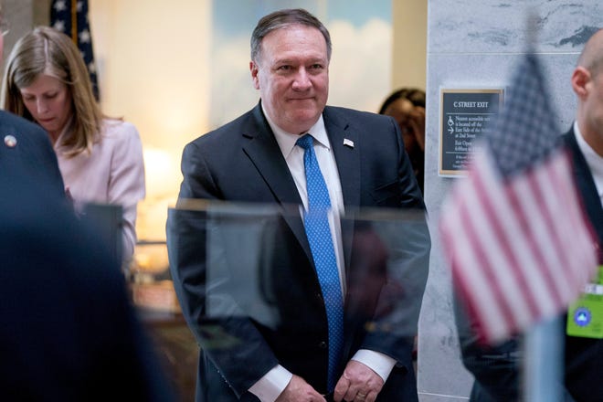 In this April 9, 2018, photo, Secretary of State nominee Mike Pompeo leaves a meeting on Capitol Hill in Washington. Outgoing CIA Director Pompeo will tell senators weighing his confirmation as secretary of state that years of soft U.S. policy toward Russia are “now over.” That’s according to excerpts of his opening statement obtained by The Associated Press ahead of his Senate hearing on April 12. (AP Photo/Andrew Harnik)