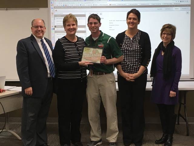 Tony Consentino, Title I Teacher at Franklin Elementary, is April’s DORs award winner. From left to right: Dr. Brad Manard, Boone Community School District Superientendant; Jan Westrum, board President; Cosentino; Heidi McPartland, 2nd-grade teacher at Franklin; and Diana Byriel, TLC- K-4 technology integration leader at Franklin. Photo by Gena Johnson/News-Republican