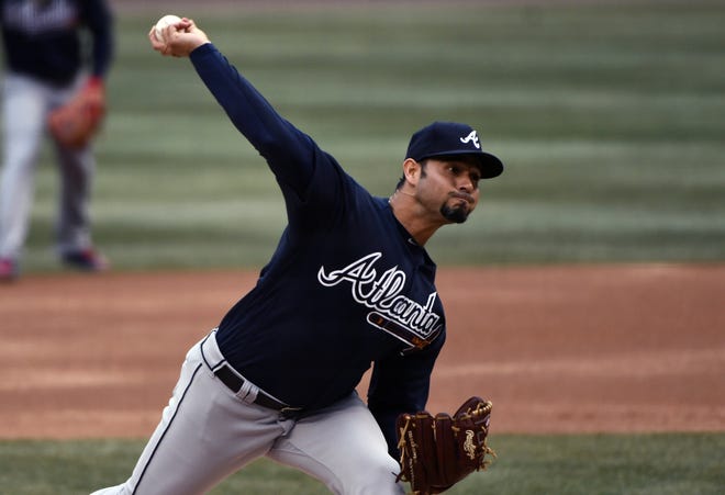 Atlanta Braves starting pitcher Anibal Sanchez (19) delivers during the first inning of a baseball game against the Chicago Cubs on Friday, April 13, 2018, in Chicago. (AP Photo/Matt Marton)