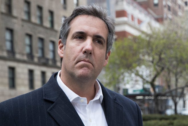 Michael Cohen, President Donald Trump's personal attorney, has been under criminal investigation for months, prosecutors revealed Friday as Cohen sought to delay review of materials seized during an FBI raid of his home, office and hotel. [AP, file / Mary Altaffer]