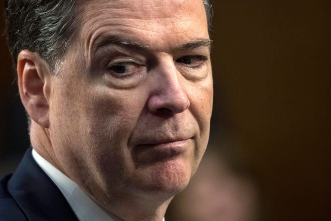 In this June 8, 2017, file photo, former FBI director James Comey testifies before the Senate Select Committee on Intelligence, on Capitol Hill in Washington. Comey blasts President Donald Trump as unethical and untethered to truth and his leadership of the country as transactional, ego driven and about personal loyalty. Comeyþ's comments come in a new book in which he casts Trump as a mafia boss-like figure who sought to blur the line between law enforcement and politics and tried to pressure him regarding the investigation into Russian election interference. [AP Photo/J. Scott Applewhite]