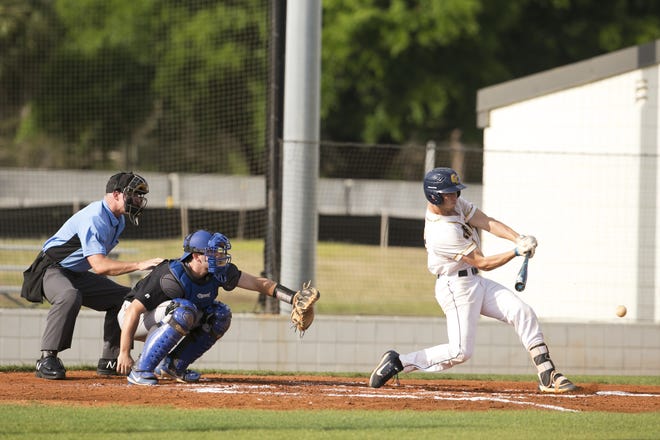 Cory Heffron leans into a pitch in Gulf Coast's 6-3 win over Tallahassee on Friday. [JOSHUA BOUCHER/THE NEWS HERALD]