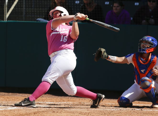 Alabama hitter Bailey Hemphill leaves no doubt as she hits a home run way out of the park against Florida on Sunday, April 8 in Rhoads Stadium. She has eight home runs this season. [Gary Cosby Jr./Staff Photo]