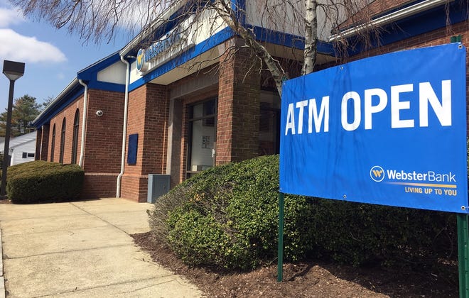 The ATM at Webster Bank's Winthrop Street branch is the only thing customers can now use since it closed for good after Friday's business day. 

Taunton Daily Gazette photo by Charles Winokoor