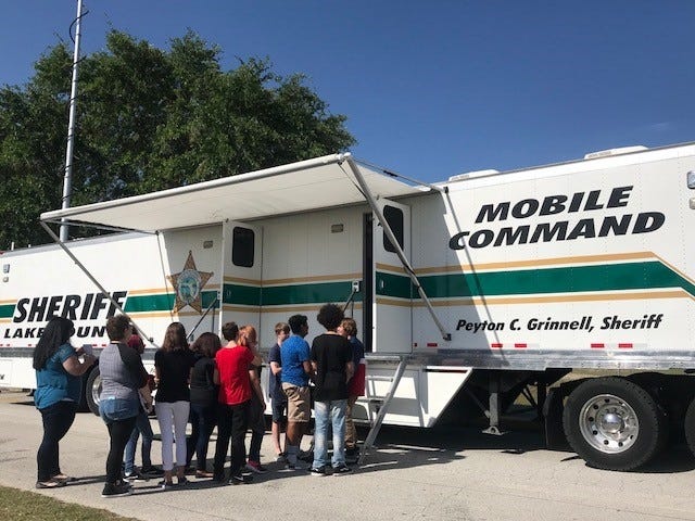 Tavares Middle School students are shown a Lake County Sheriff's Office Mobile Command Center for First Responders Day at the school. [SUBMITTED]