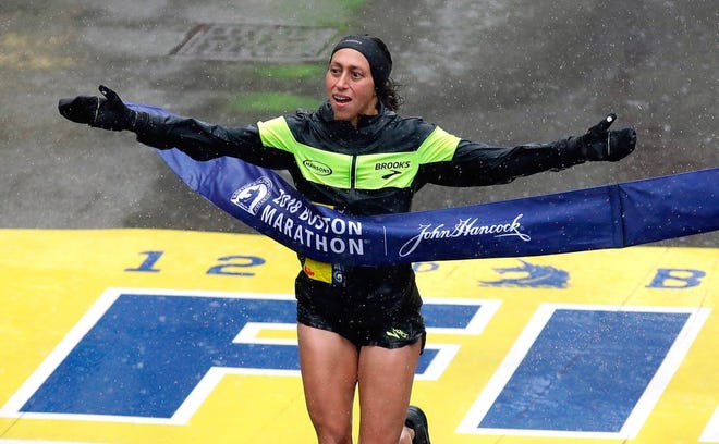Desiree Linden, of Michigan, wins the women's division of the 122nd Boston Marathon on Monday.