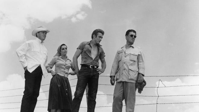George Stevens Jr. (from left), Elizabeth Taylor, James Dean and director George Stevens on the set of “Giant” in 1955.