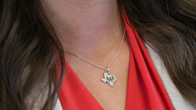 James Avery Artisan Jewelry teamed up with Whataburger to create a charm featuring the fast food chain's logo on the popular sterling silver charm in the shape of Texas.