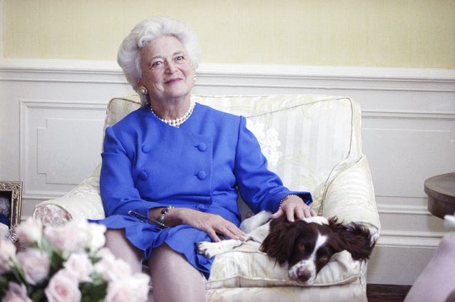 In this 1990 file photo, first lady Barbara Bush poses with her dog Millie in Washington. A family spokesman said Tuesday, April 17, that former first lady Barbara Bush has died at the age of 92. [ AP ]