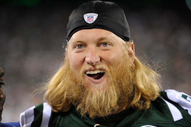 Former New York Jets center Nick Mangold has announced his retirement from playing football after 11 seasons in which he established himself as one of the NFL's best at his position. [AP Photo/Bill Kostroun, File]