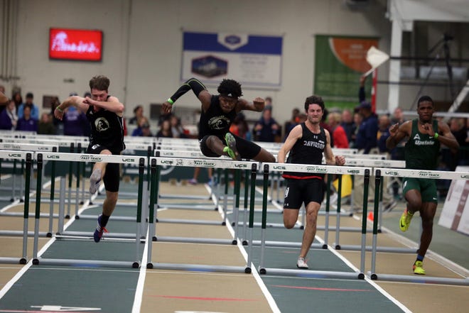 Javon Graham, center, competes for UNC Pembroke at an indoor meet earlier this season. The Jack Britt High graduate is ranked among the top NCAA Division II hurdlers in the 110 meter event. [UNCP photo)