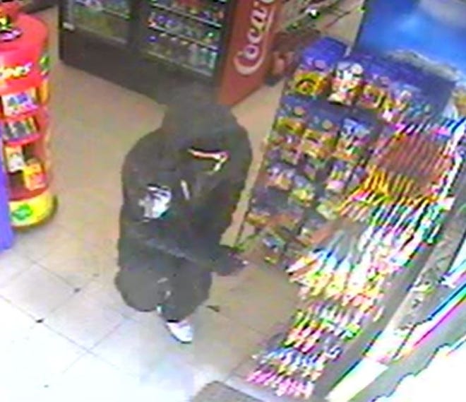 Rochester police are searching for this man who allegedly robbed Highland Street Convenience in East Rochester Wednesday morning. The suspect is reportedly in his 20s, about 5 feet, 8 inches tall and has a medium build, dark eyes and dark complexion. [Courtesy photo]