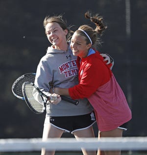 Monterey's Gracelyn Anderson and Ashley Bustos celebrate after winning during their doubles match in the Region I-5A Tournament on Wednesday at Texas Tech's McLeod Tennis Center. Anderson and Bustos advanced to the 5A state tournament. [Brad Tollefson/A-J Media]