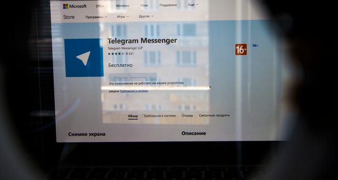 The website of the Telegram messaging app is seen on a computer's screen in Moscow, Russia, Friday, April 13, 2018. A Russian court has ordered the blocking of a popular messaging app following a demand by authorities that it share encryption data with them. (AP Photo/Alexander Zemlianichenko)