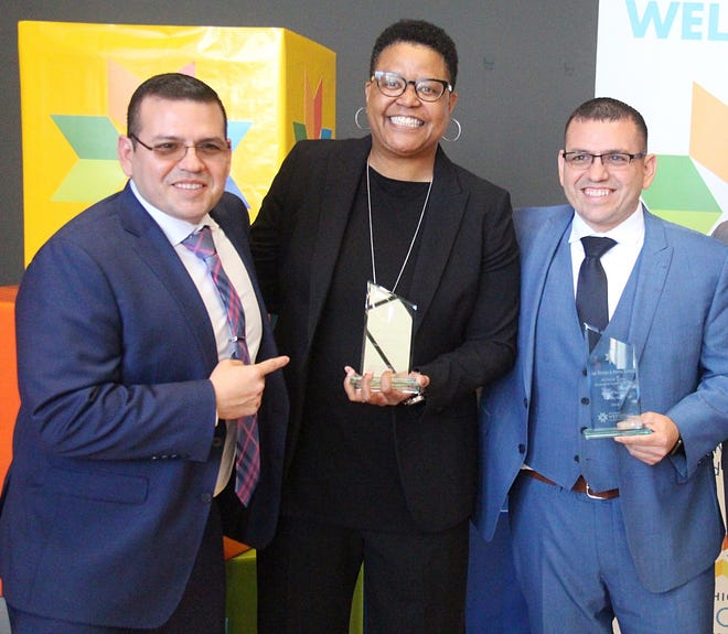 The West Coast Chamber of Commerce handed out the 2018 Minority Awards at the Midtown Center on April 18. Pictured from left are winners Leo Barajas, Malisa L. Bryant, and Manuel Barajas. [Austin Metz/Sentinel Staff]