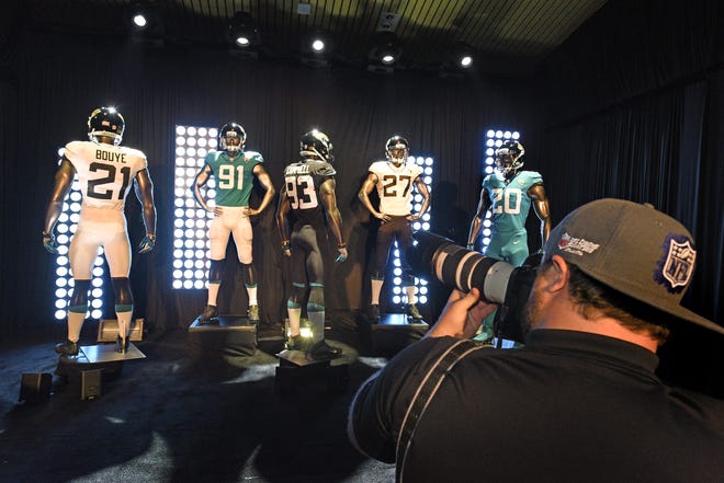 The team's new uniforms are presented at the Jaguars' State of the Franchise event Thursday at EverBank Field. [BOB SELF/GateHouse Florida]