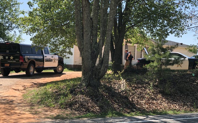The Cleveland County Sheriff's Office were investigating a scene on W. Zion Road Thursday afternoon. [Casey White/The Star]