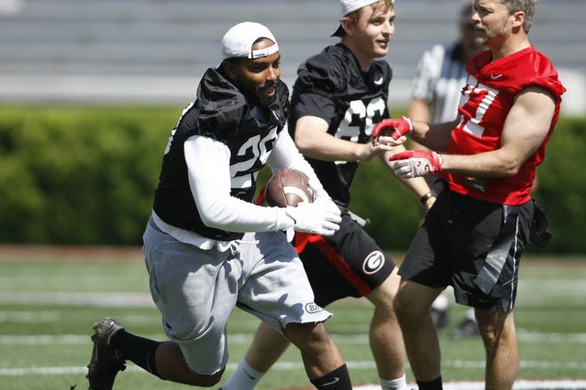 Georgia football letter winners play in the annual letterman's flag football game during G-Day at Sanford Stadium in Athens, Ga. on Saturday, April 22, 2017. (Photo by Cory A. Cole)
