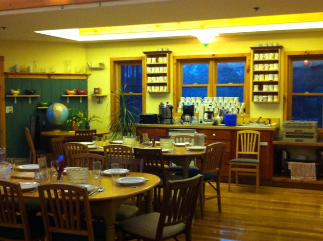A dining room where a weekly community dinner is held at Pioneer Valley Cohousing in Amherst, Mass. [Photo by A. Whitney Sanford]