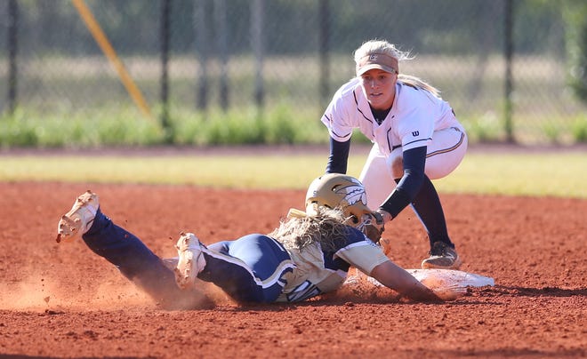 Chipola's Ally Klegg is tagged out at second base by Gulf Coast's Kristina Warford during a game Monday in Panama City. [PATTI BLAKE/THE NEWS HERALD]