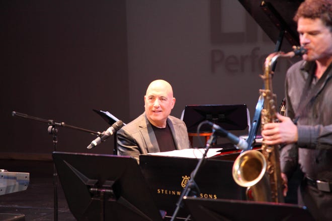 David Bowie's longtime pianist Mike Garson (left) will perform at the Lincoln Park Performing Arts Center on Thursday. Garson will be backed by a band led by The Clarks' Scott Blasey and Grammy-winning saxophonist Eric DeFade (right). [Lincoln Park Performing Arts Center]