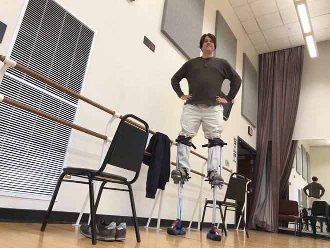 Scott learns how to walk on stilts like the giant in "Big Fish," the heartwarming musical running through May 6 at the Lincoln Park Performing Arts Center. [Gwen Titley/BCT staff]