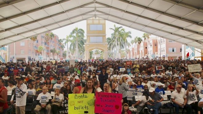 Thousands gather at Mizner Park Amphitheater March 24 in Boca Raton for the March for Our Lives to demand gun control after the Parkland shooting on Valentine’s Day. (Carla Trivino/The Palm Beach Post)