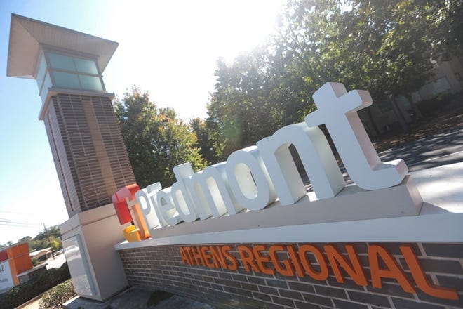 The new Piedmont Athens Regional Medical Center sign is seen off Prince Avenue after a ribbon-cutting ceremony for the merger between Piedmont Healthcare and Athens Regional Health Services in October 2016. [File/Staff]