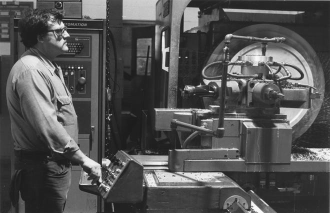 In this undated file photo, an employee of Murray Iron Works in Burlington works at a machine at the former plant on Central Avenue in Burlington. The plant was torn down after its acquisition by the city of Burlington following a 2005 deal to keep Dresser-Rand in the city. [file/thehawkeye.com]